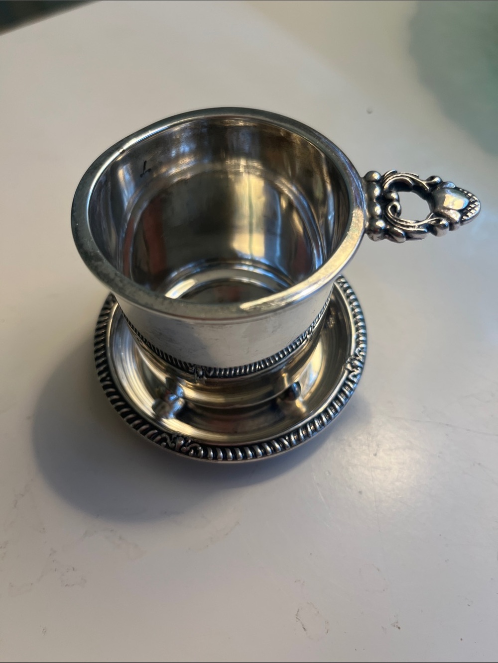 Vintage sterling silver wine cup with saucer